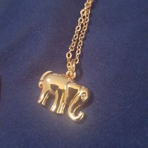 Gold elephant pendant